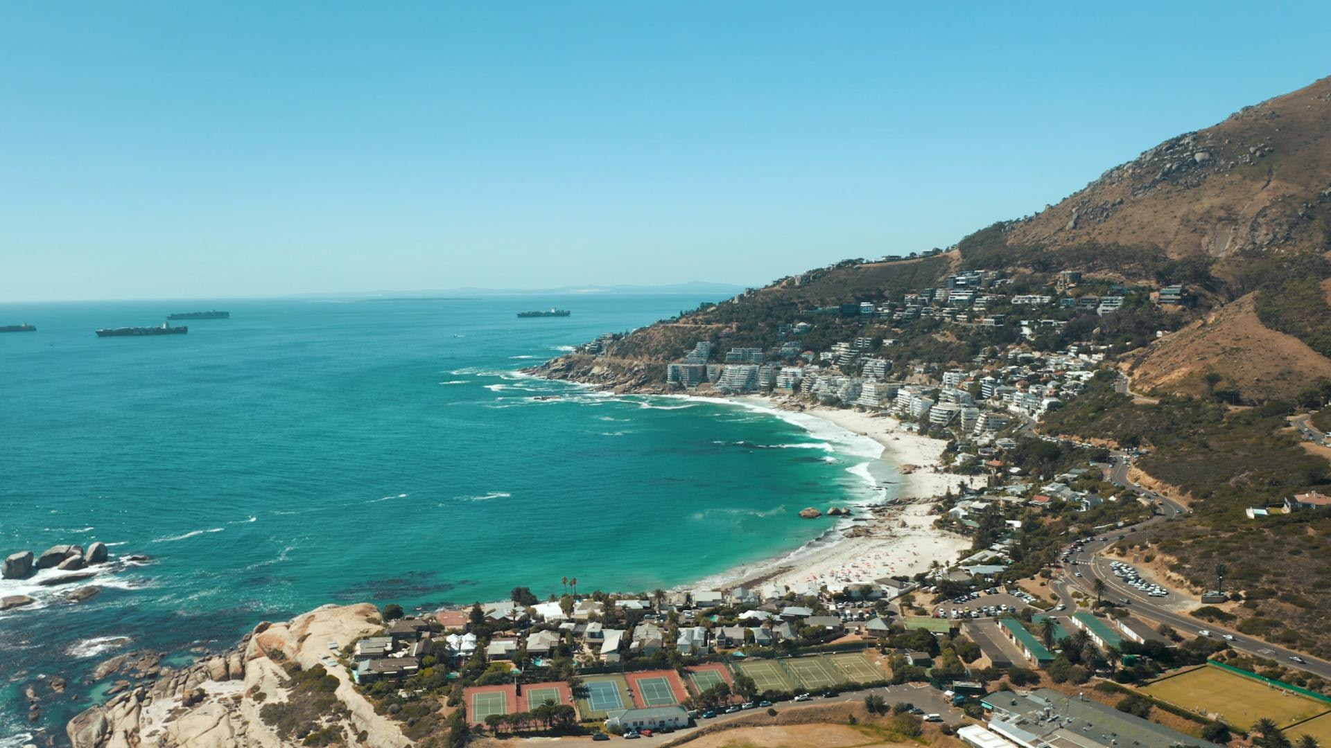 Table Mountain rising over Cape Town with the Atlantic coastline of the Western Cape in the foreground